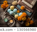 Spa arrangement with colorful bath bombs, fresh marigold flowers 130566980