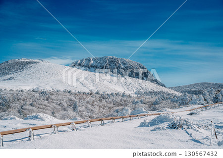 Snow transport track covered in snow on Eorimok Trail, Hallasan, Jeju 130567432