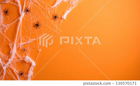An autumnal Halloween pumpkin sits on a black background, its vibrant orange hue and detailed leaf illustrations capturing the essence of the fall harvest season An autumnal Halloween pumpkin sits on a black background, its vibrant orange hue and detailed leaf illustrations capturing the essence of the fall harvest season 130570171