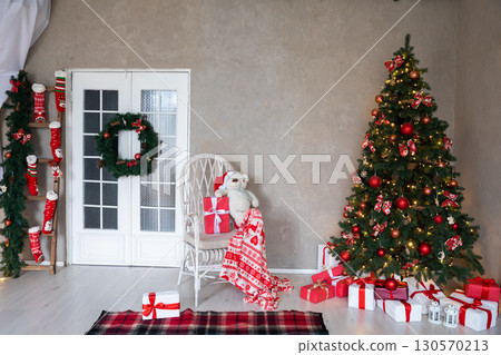 Room with christmas tree and presents 130570213