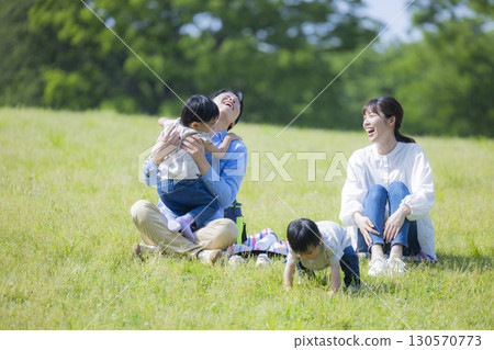 Family having a picnic 130570773