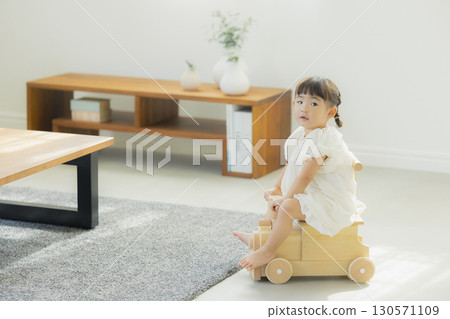 Girls playing with toys 130571109