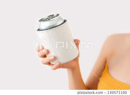 Hand holding white koozie with silver can mockup, ai generated 130571180