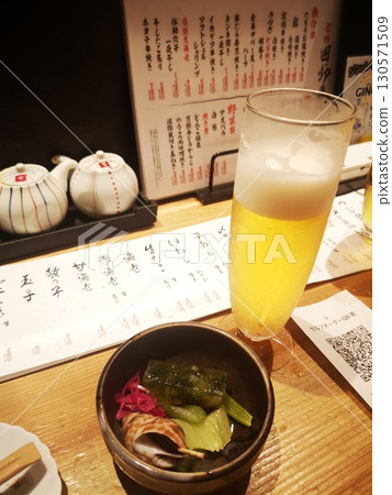 Beer at a sushi restaurant 130571509