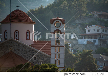 Panagia Eleousa Church bell tower rising above Agros village in Cyprus Panagia Eleousa Church bell tower rising above Agros village in Cyprus 130571709