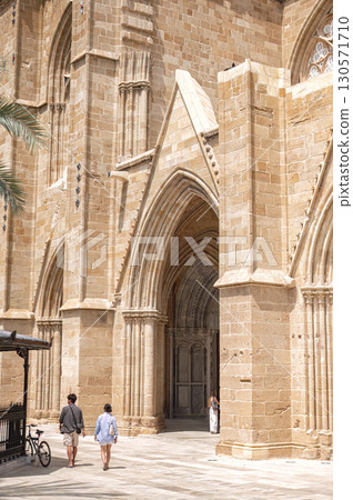 Tourists walking near the Selimiye Mosque in Nicosia, Cyprus Tourists walking near the Selimiye Mosque in Nicosia, Cyprus 130571710