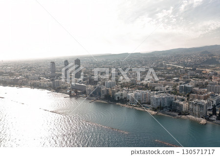 Germasogeia, Limassol, Cyprus cityscape featuring buildings and seafront on Odos Vasileos Georgiou A' Germasogeia, Limassol, Cyprus cityscape featuring buildings and seafront on Odos Vasileos Georgiou A' 130571717