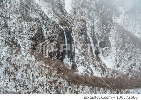 Snowy cliffs and frozen waterfalls on Yeongsil Trail, Hallasan, Jeju Island, South Korea 130572660