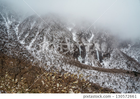Snowy cliffs and frozen waterfalls on Yeongsil Trail, Hallasan, Jeju Island, South Korea 130572661