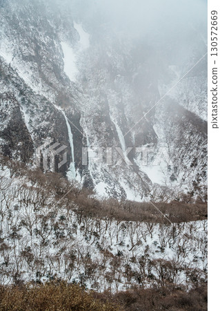 Snowy cliffs and frozen waterfalls on Yeongsil Trail, Hallasan, Jeju Island, South Korea 130572669