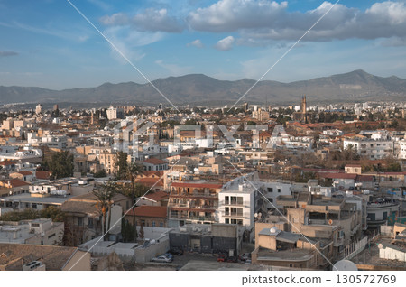 Nicosia city skyline on sunny day with mountains in background, Cyprus 130572769
