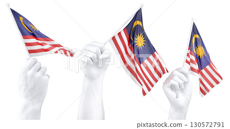 Hand holding flag of Malaysia. Isolated 3d Rendering Hand holding flag of Malaysia. Isolated 3d Rendering 130572791