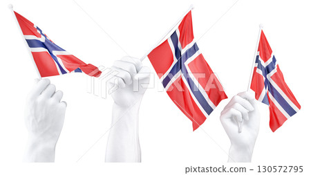 Hand holding flag of Norway. Isolated 3d Rendering Hand holding flag of Norway. Isolated 3d Rendering 130572795