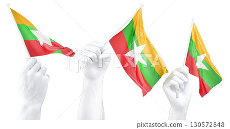 Hand holding flag of Myanmar. Isolated 3d Rendering Hand holding flag of Myanmar. Isolated 3d Rendering 130572848