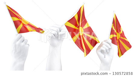 Hand holding flag of North Macedonia. Isolated 3d Rendering Hand holding flag of North Macedonia. Isolated 3d Rendering 130572858