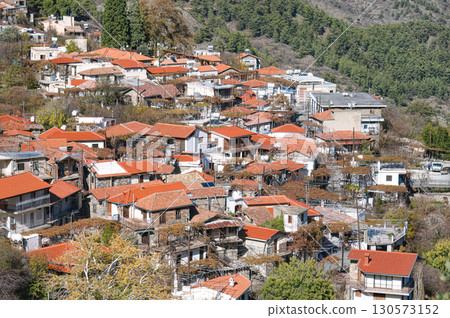 Picturesque mountain village with traditional red tile roofs in cyprus showing residential homes 130573152