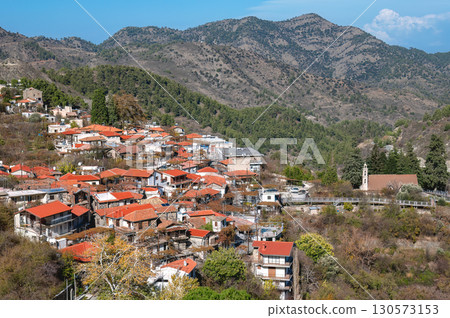 Picturesque mountain village with red tile roofs in cyprus showing traditional architecture Picturesque mountain village with red tile roofs in cyprus showing traditional architecture 130573153