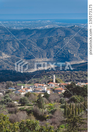 Kato Lefkara village overlooking mountains and artificial lake in Cyprus Kato Lefkara village overlooking mountains and artificial lake in Cyprus 130573175