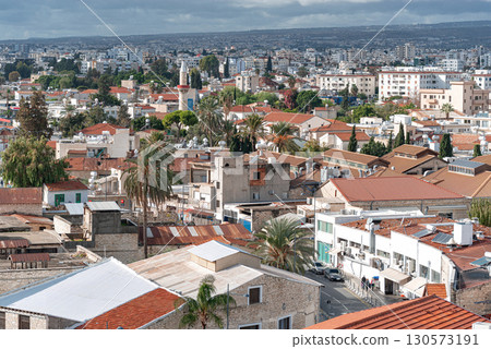 Limassol Old Town cityscape showing traditional and modern architecture under cloudy sky in Cyprus Limassol Old Town cityscape showing traditional and modern architecture under cloudy sky in Cyprus 130573191