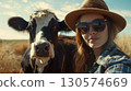 Woman and cow selfie on farm, ideal for farming, animal care, and rural friendship images 130574669