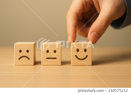 Customer Feedback Selection Emotions Displayed through Wooden Cubes Soft Light Tabletop Human Touch Concept 130575212