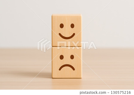 Emotional Resilience Overcoming Negativity with Stacked Wooden Blocks Minimalist Tabletop Scene Mental Health Awareness 130575216