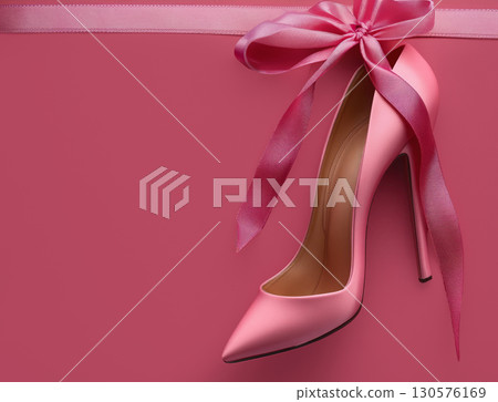 Stylish pair stylish pink fuchsia high heels featuring charming bow, perfect for elegant occasions and fashionable events, Fashion Style background, place for text, banner, advertising, sale 130576169