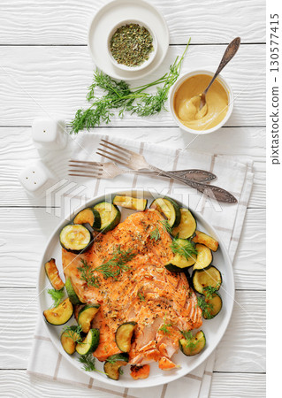 freshly baked salmon fillet with zucchini and dill 130577415