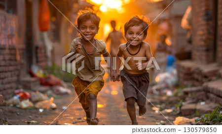 Joyful indian boys in a bustling foreign rural indian street, capturing the essence of childhood playfulness. 130579850