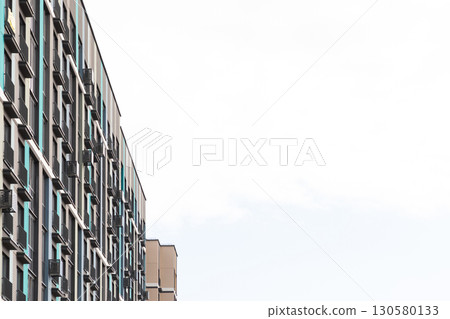 High-rise apartment buildings in a residential area illustrating urban living and property 130580133