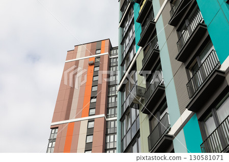 High-rise apartment buildings in a modern residential area with diverse architecture and available High-rise apartment buildings in a modern residential area with diverse architecture and available 130581071