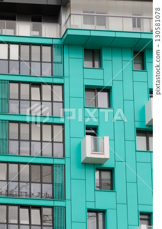 Tall residential buildings showcasing modern architecture in a vibrant neighborhood discussing Tall residential buildings showcasing modern architecture in a vibrant neighborhood discussing 130581078