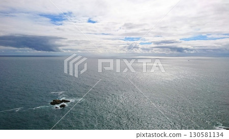 Dramatic cloudy sky over the vast Atlantic Ocean at Cabo da Roca, Europe's westernmost point 130581134