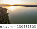 Spectacular sunset over lake Balaton with golden reflections, Hungary. 130581303