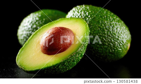 Fresh Ripe Avocado Cut in Half with Seed Fresh Ripe Avocado Cut in Half with Seed 130581438