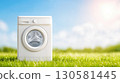 Washing Machine on Grass Outdoors 130581445