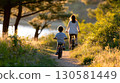 Mother and Child Riding Bicycles 130581449