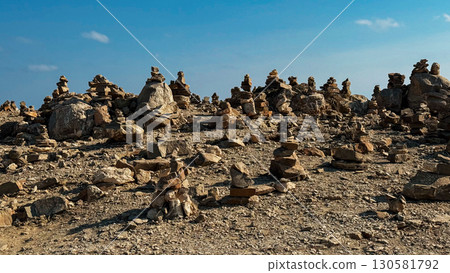 Stone cairns stacked across Stone cairns stacked across 130581792