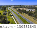 The Northern Road running through the suburb of Bringelly 130581843