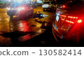 REAR LIGHTS OF CARS AT NIGHT 130582414