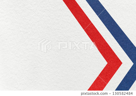 White textured paper background with red and blue arrow shapes and copy space. Abstract geometric graphic banner 130582484