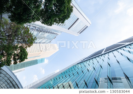 Landscape of the office town looking up at a skyscraper Landscape of the office town looking up at a skyscraper 130583044