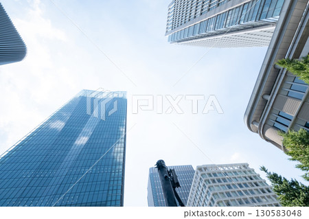 Landscape of the office town looking up at a skyscraper 130583048