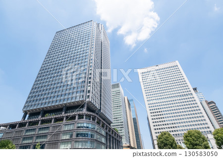 Landscape of the office town looking up at a skyscraper Landscape of the office town looking up at a skyscraper 130583050