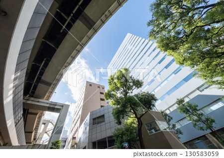Metropolitan Expressway running through the valley between buildings 130583059