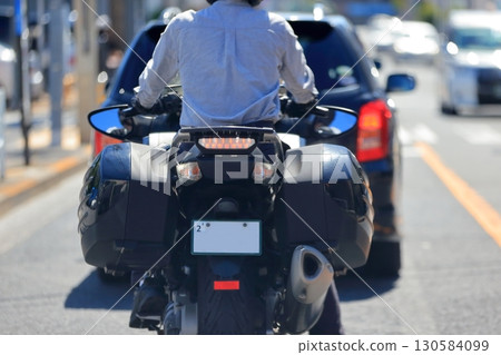 Image of a moving motorcycle Image of a moving motorcycle 130584099