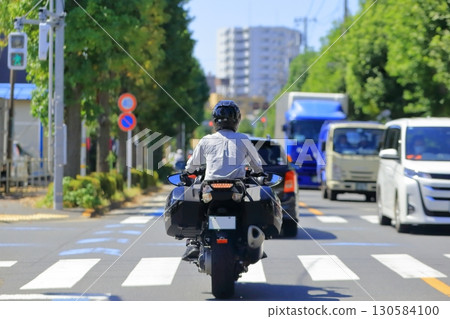 Image of a moving motorcycle Image of a moving motorcycle 130584100