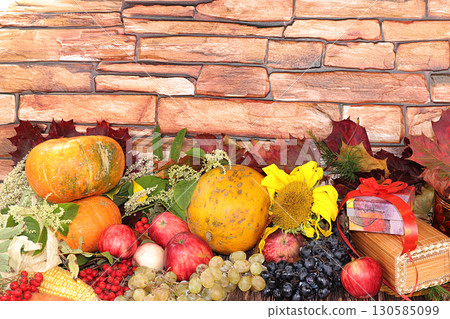 Thanksgiving, autumn background with seasonal autumn nature berries, pumpkins, apples, gifts and leaves on wooden background, copy space. Happy Thanksgiving concept, selective focus. 130585099