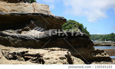Rocks exposed at low tide 130585283