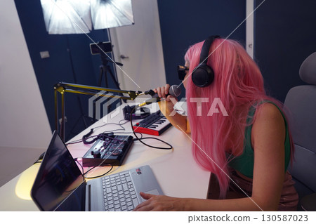 Beautiful young singer and musician broadcast from her home studio Beautiful young singer and musician broadcast from her home studio 130587023